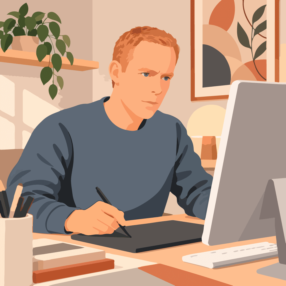 portrait-graphiste graphiste à son bureau